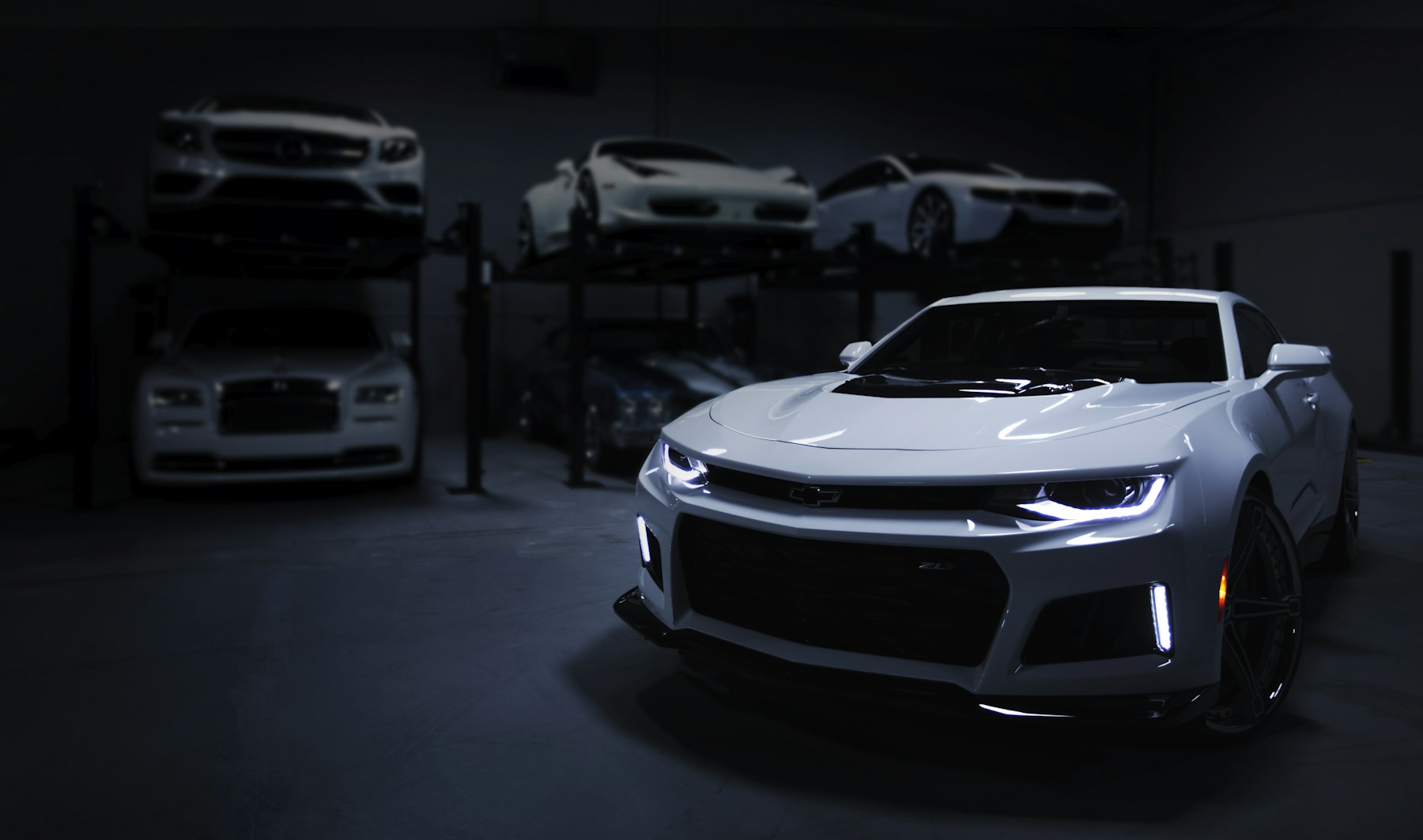 White sports coupe in a garage; editorial stock photography, not a customer result